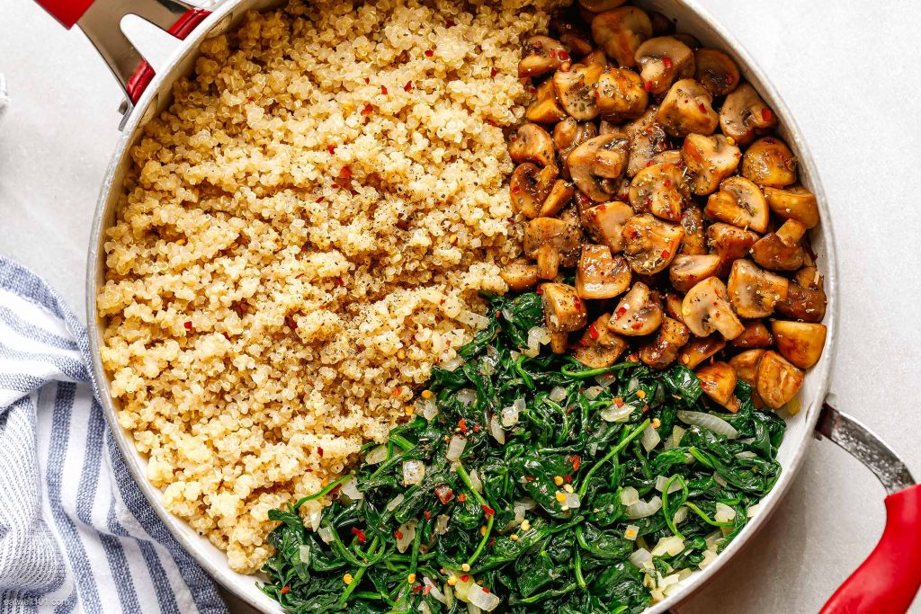 Quinoa with Mushroom Spinach in skillet