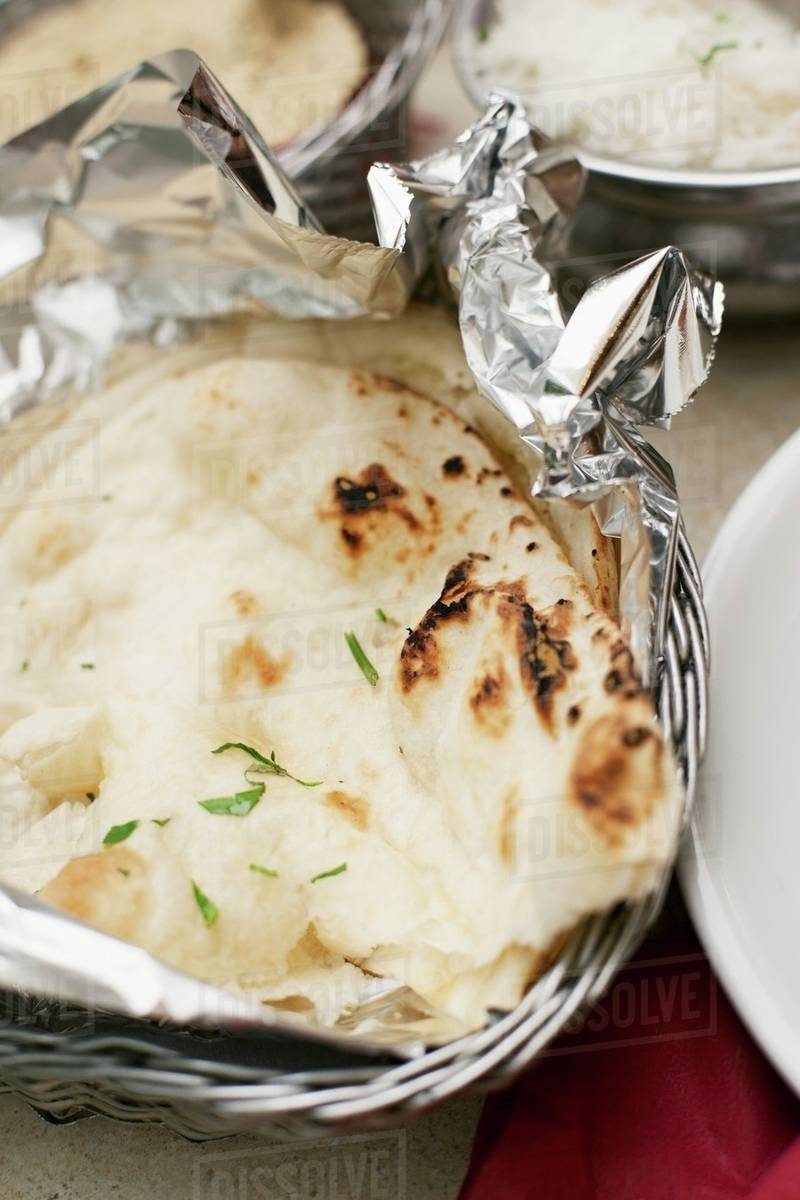 naan bread in aluminum foil for freezing