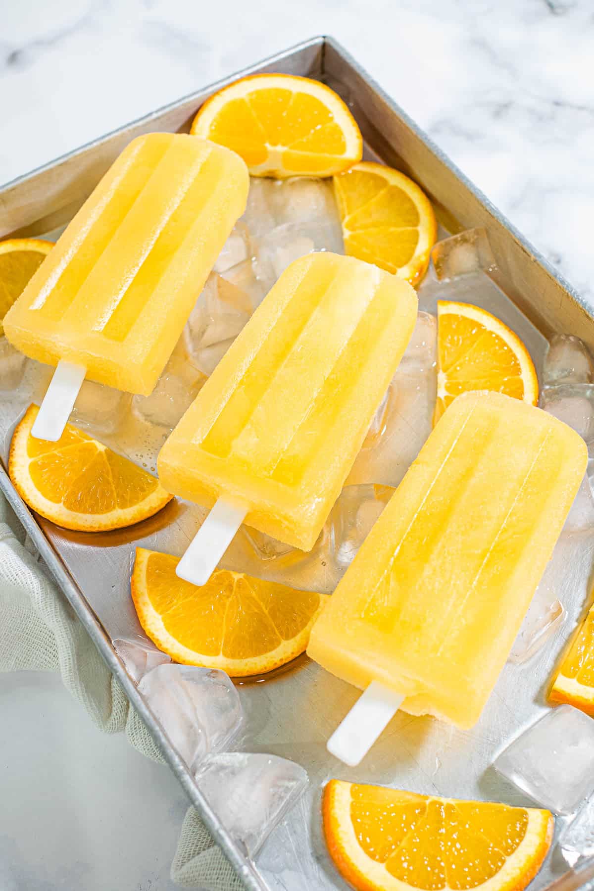 orange-popsicles with frozen juice