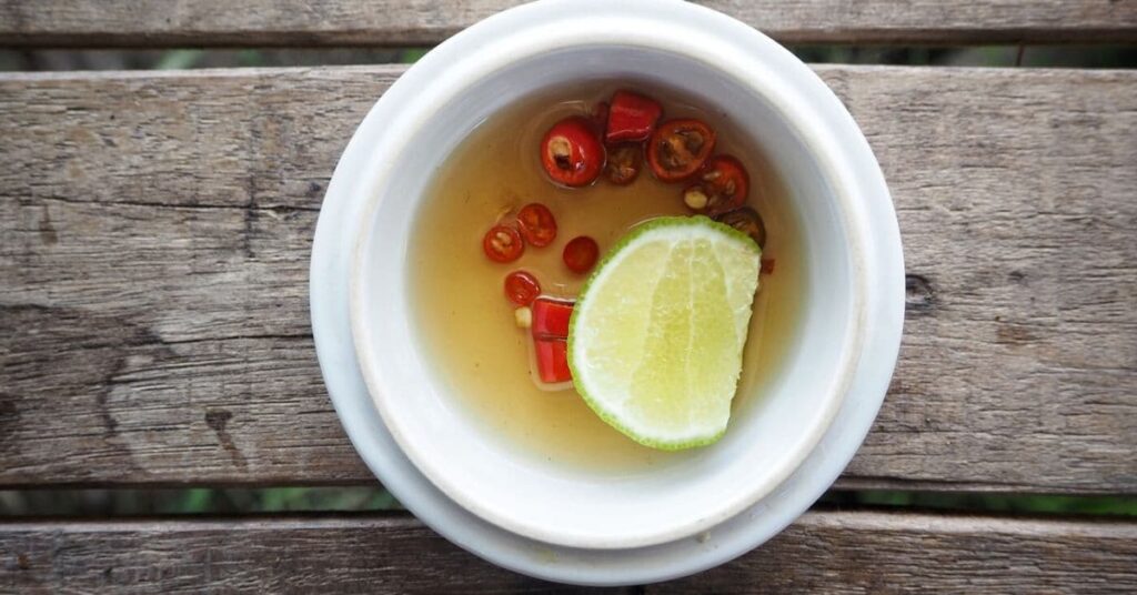 fish-sauce with lime and red chili in bowl