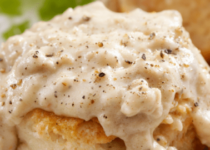 Hardees Gravy Recipe with seasoning sprinkled over it-cookingthursday.com